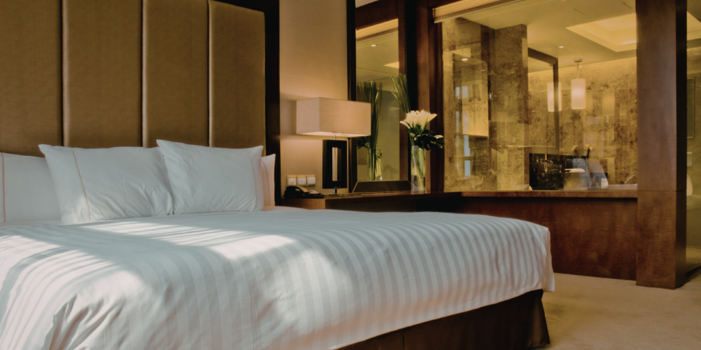 A spacious luxury hotel suite designed for comfort and relaxation.