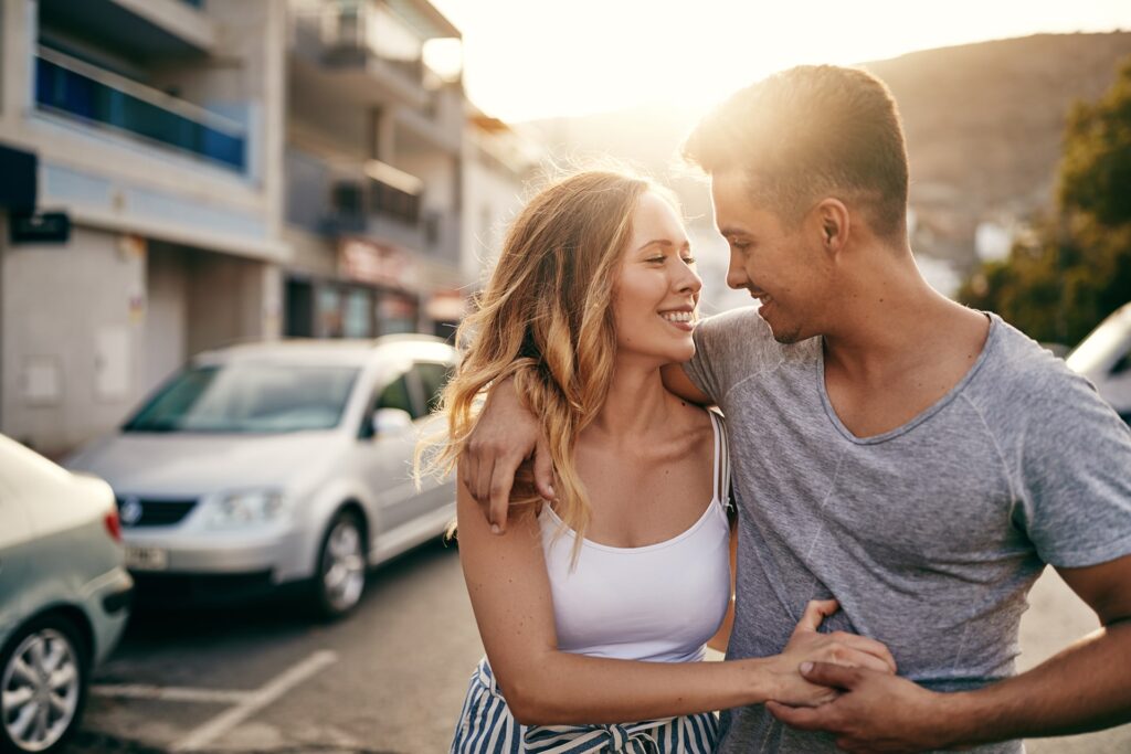 affectionate-young-couple-enjoying-a-walk