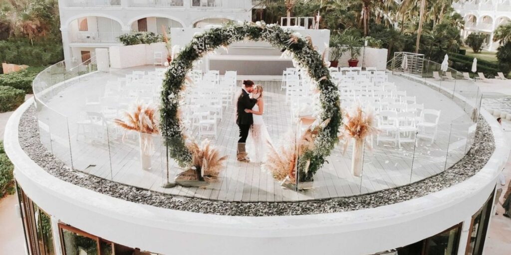 Cabo brings a more elevated and intimate wedding setting with design-focused venues and private ceremony spaces.