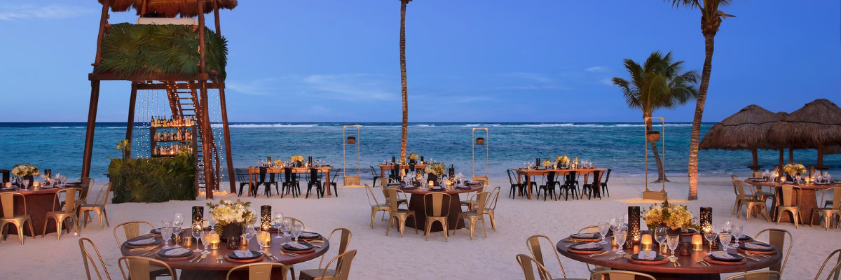 As the sun sets, your celebration comes to life with ocean views, candlelight, and an unforgettable evening by the beach.