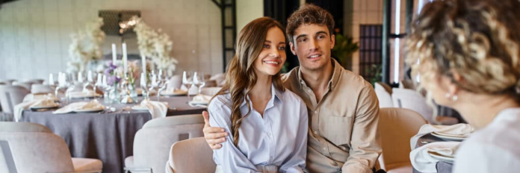 Couple meeting with a wedding planner.