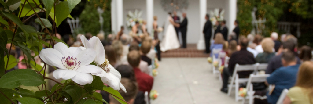 outdoor summer wedding ceremony timed for golden hour.